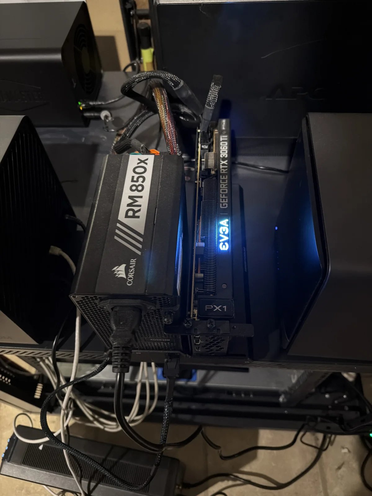 An RTX 3060 Ti in an external OcuLink dock powered by a Corsair 850x PSU, feeding kratos
